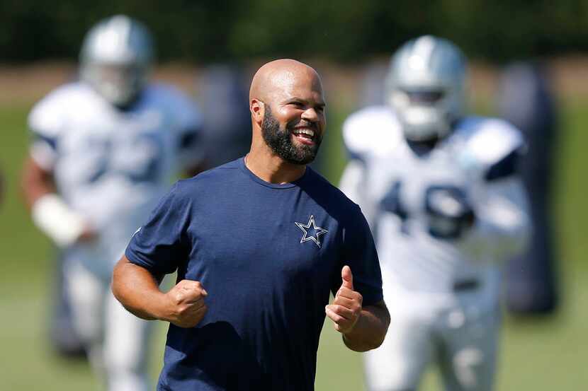 Dallas Cowboys passing game coordinator and defensive backs coach Kris Richard runs with the...