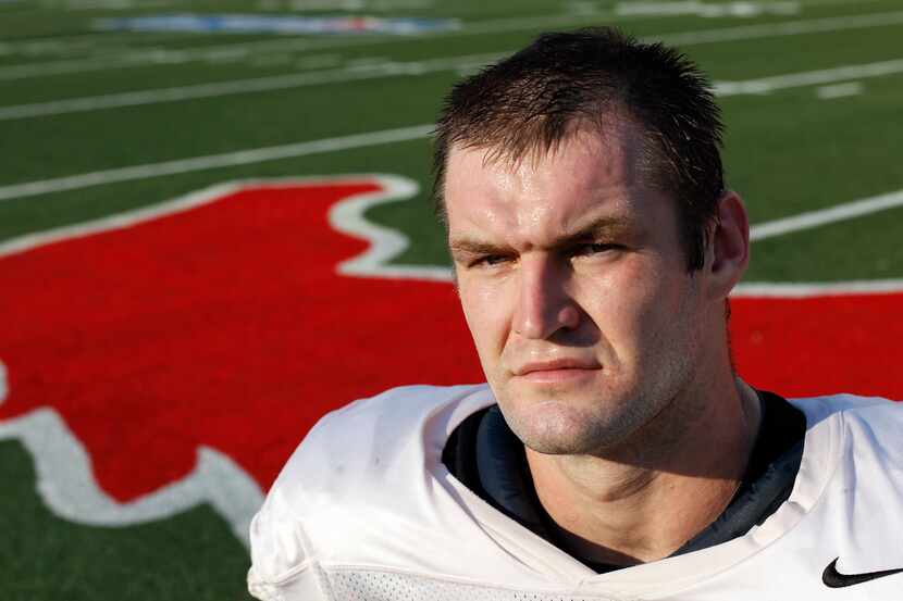 Margus Hunt poses for a portrait after practice at SMU in Dallas September 24, 2012.