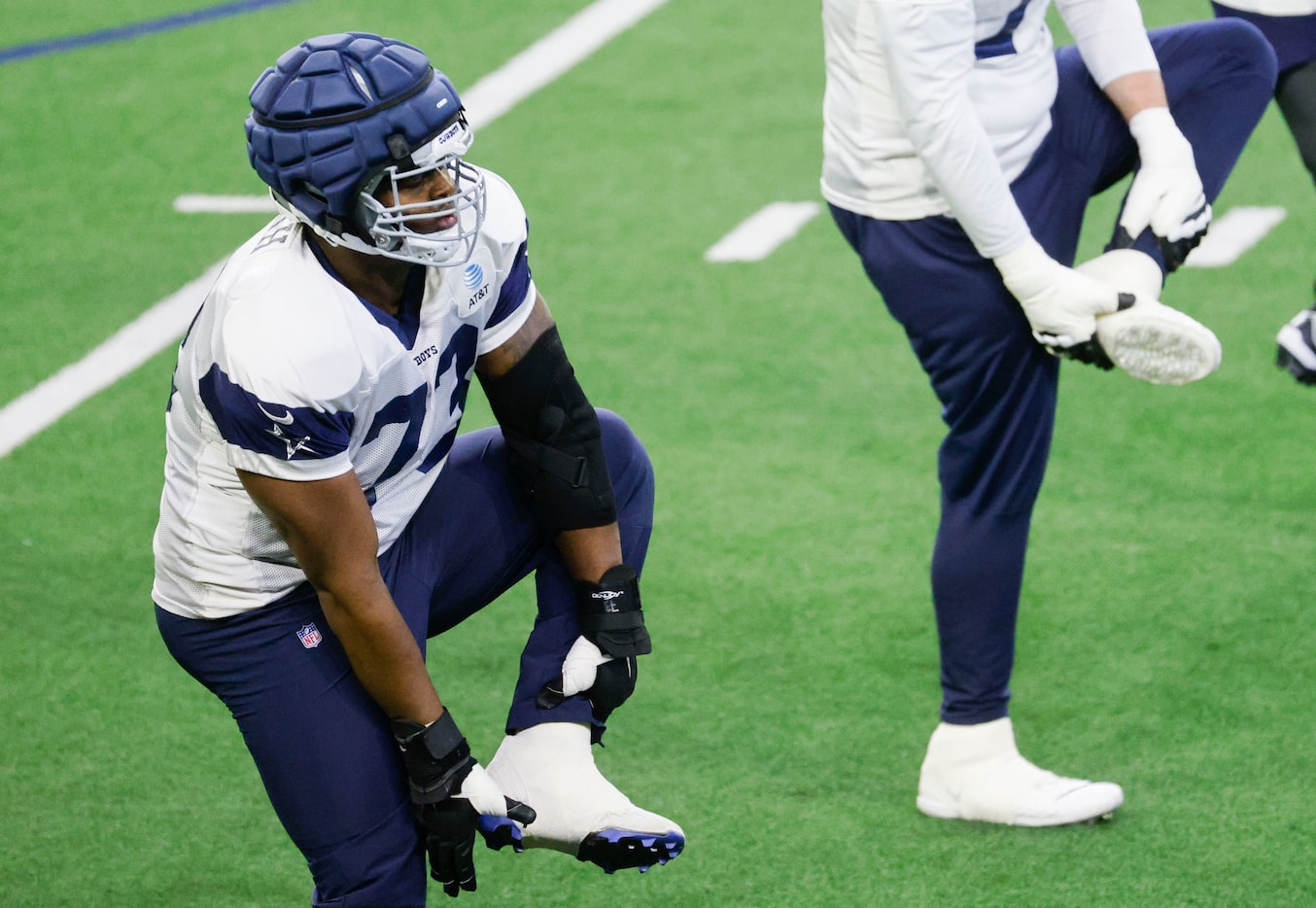 Dallas Cowboys offensive tackle Tyler Smith (73) stretches during team practice at The Star...