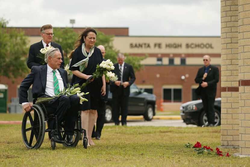 Texas Gov. Greg Abbott and his wife, Cecilia Abbott, arrived at Santa Fe High School with...