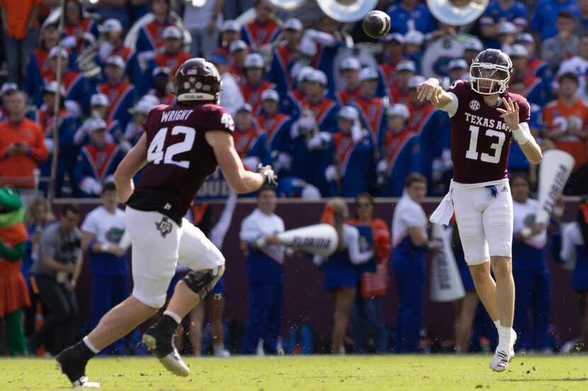 Texas A&M quarterback Haynes King (13) passes the ball to tight end Max Wright (42) during...