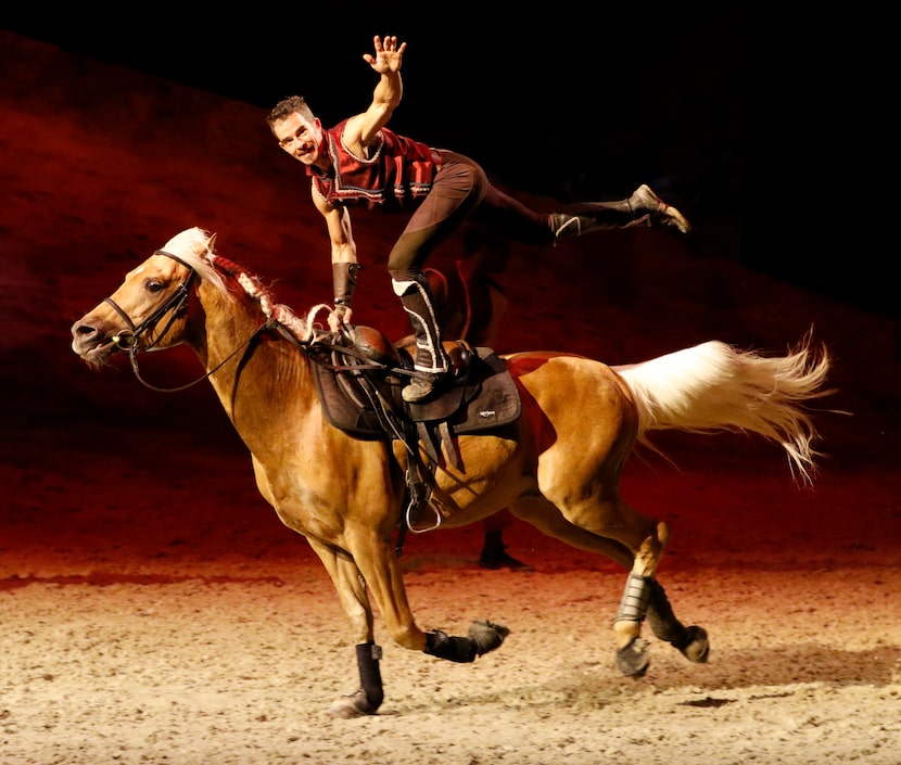 A trick rider performs during a preview of Cavalia's production Odysseo in Frisco, Texas on...