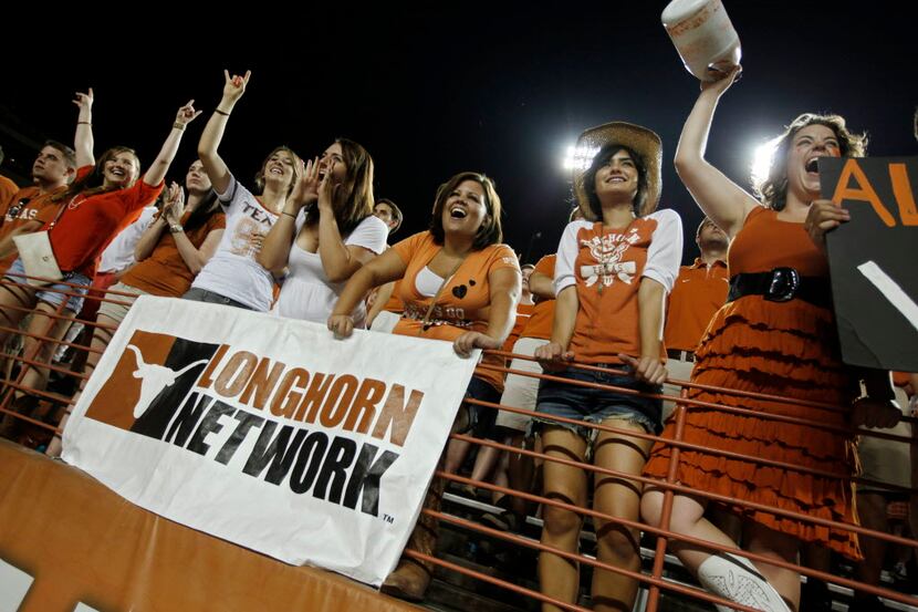 AUSTIN, TX - SEPTEMBER 3:  University of Texas fans cheer on the Longhorns as they play the...