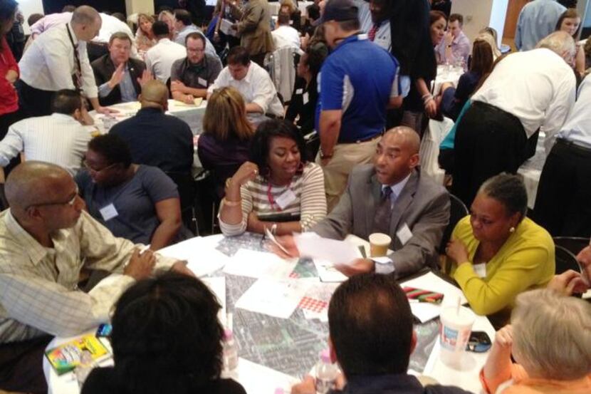 
At the Housing Plus meeting Thursday, leaders huddled over maps and data sheets to dissect...