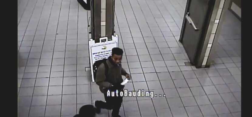 Another image taken from surveillance footage of the suspects.