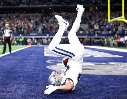 Dallas Cowboys wide receiver Ryan Switzer (10) dives into the end zone after returning a...