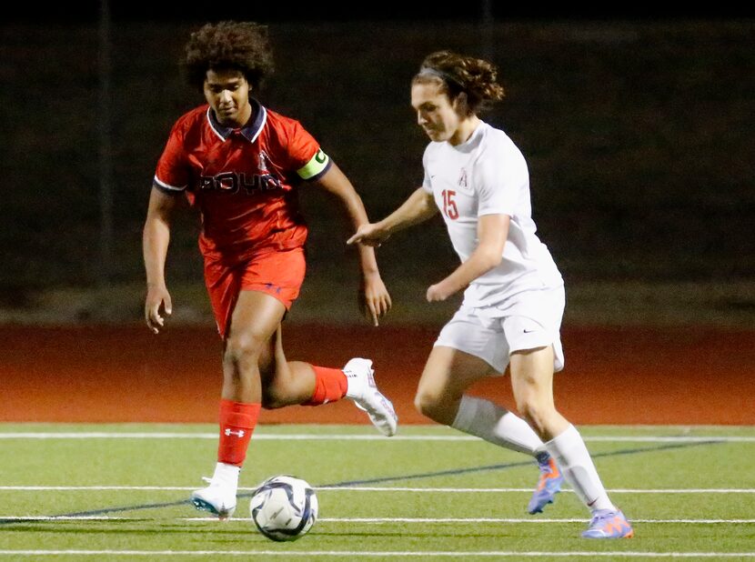 McKinney Boyd High School defender Caleb Sempebwa (3) defends Allen High School defender...