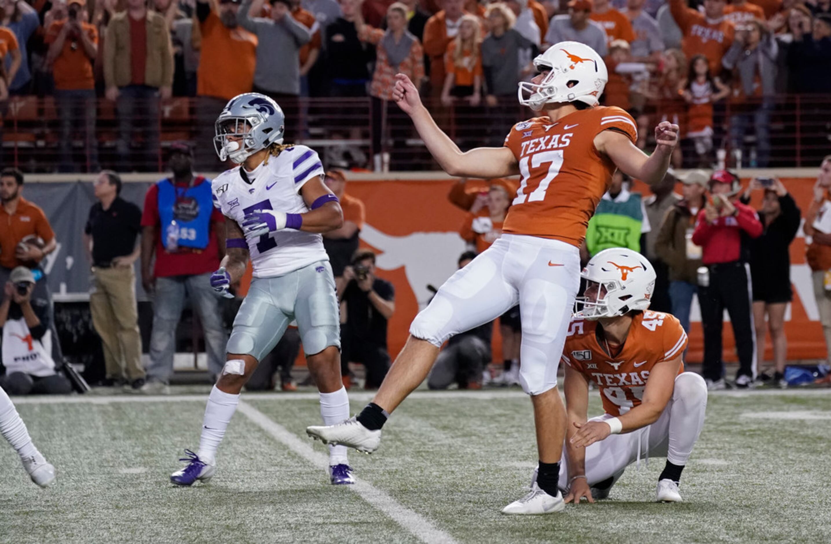 Texas' Cameron Dicker (17) watches his last-second winning field goal against Kansas State...