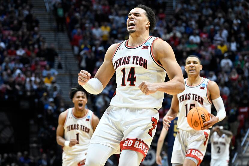 Texas Tech forward Marcus Santos-Silva (14) reacts at the end of a second-round NCAA college...