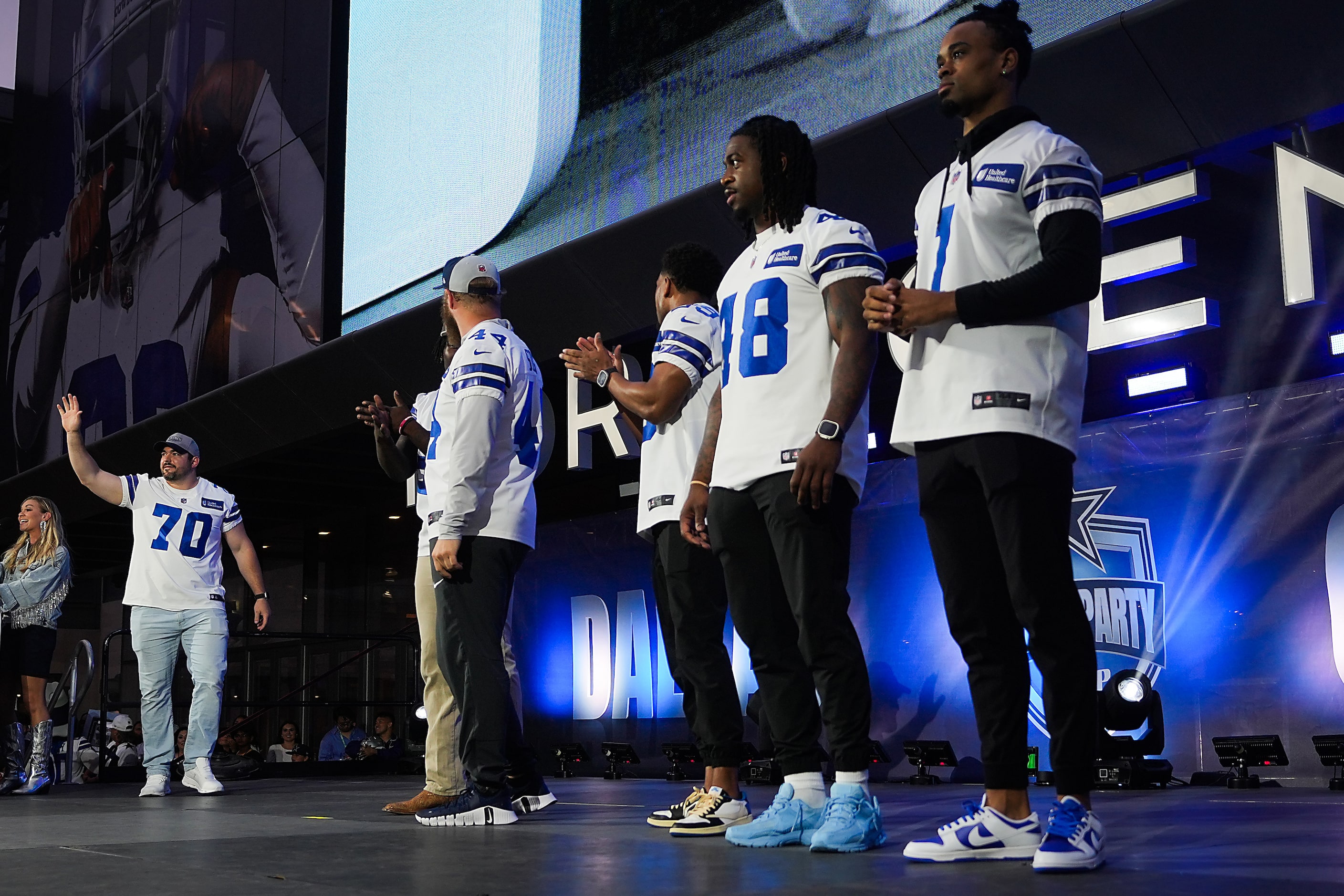 Dallas Cowboys guard Zack Martin (70) waves to fans as he is introduced during a draft party...