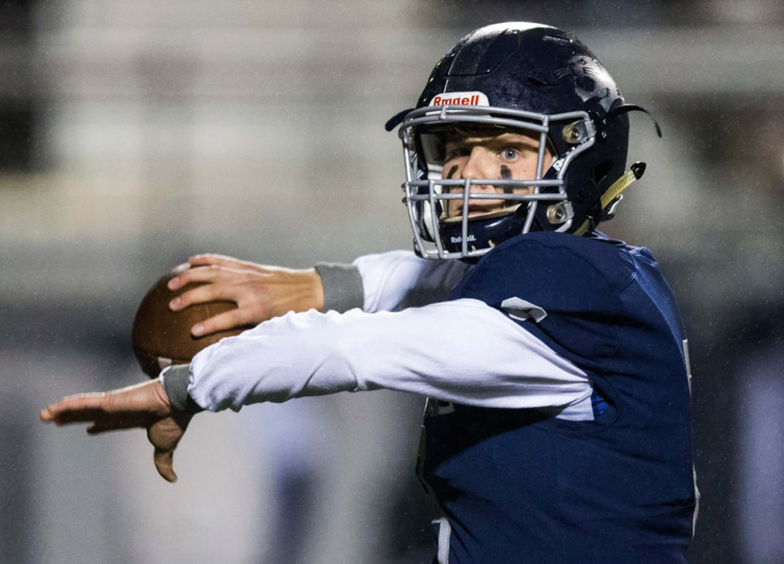 Flower Mound quarterback Blake Short (8) throws a pass during the first quarter of a...