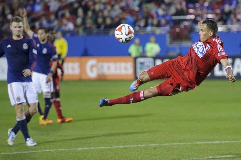 FC Dallas's Blas Perez looks to take a shot on goal against Chivas USA during an MLS soccer...