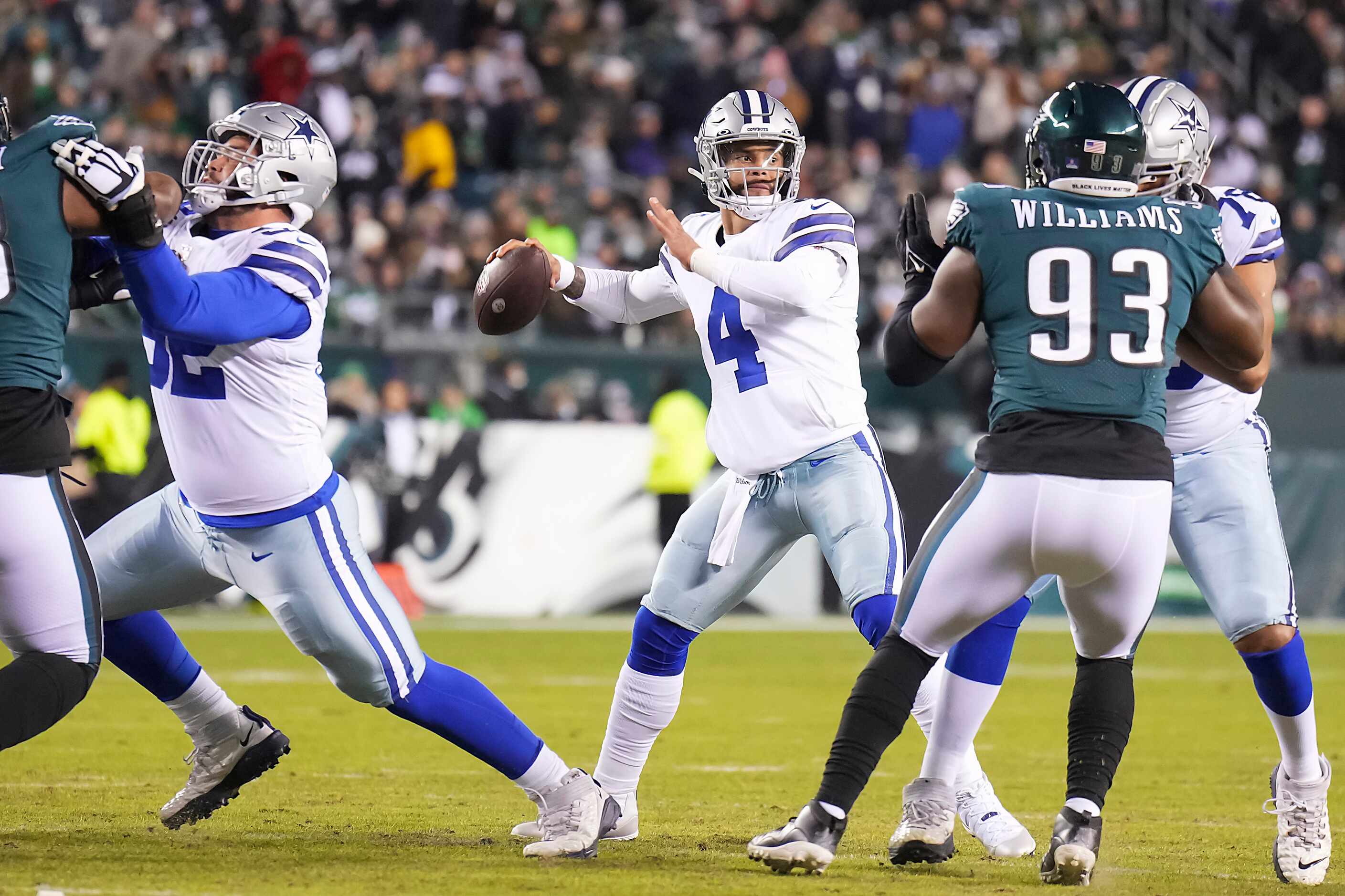 Dallas Cowboys quarterback Dak Prescott (4) throws a 14-yard touchdown pass with protection...