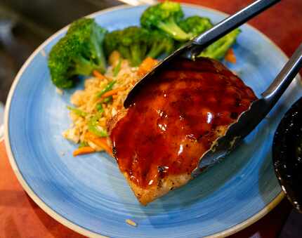 Maguire's maple-ginger salmon is one of its more popular dishes.