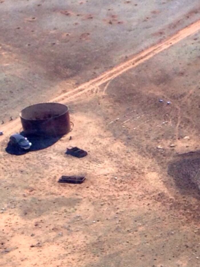 Amber VanHecke built a large "HELP" sign out of rocks. (Arizona Department of Public Safety)