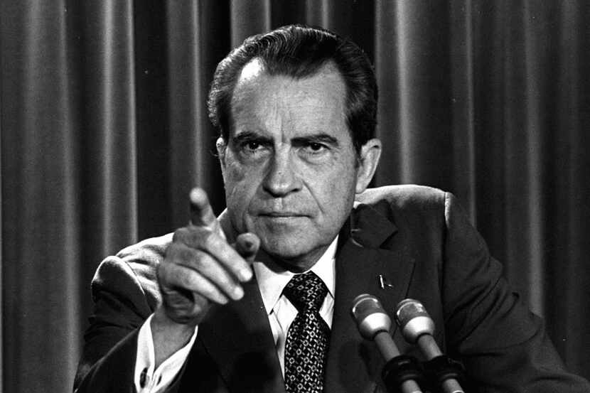 In this March 15, 1973, file photo, President Richard Nixon tells a White House news...