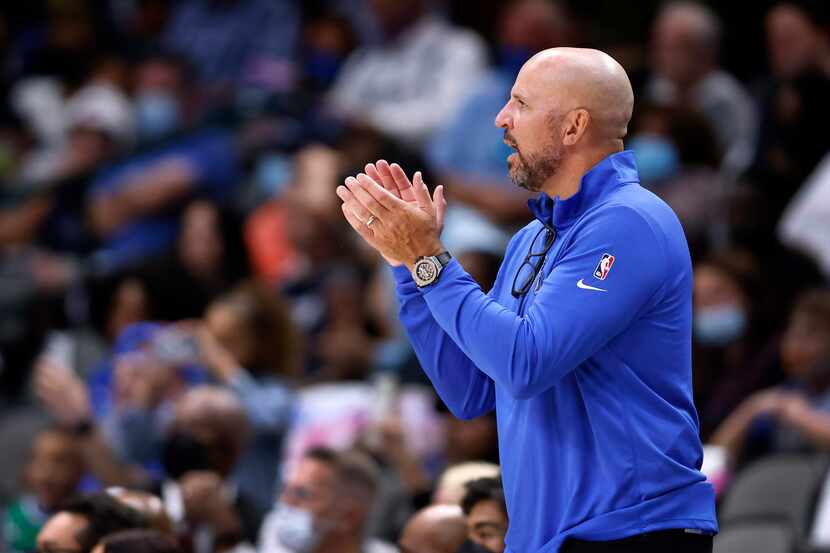 Dallas Mavericks head coach Jason Kidd applauds his team face the Utah Jazz in the second...