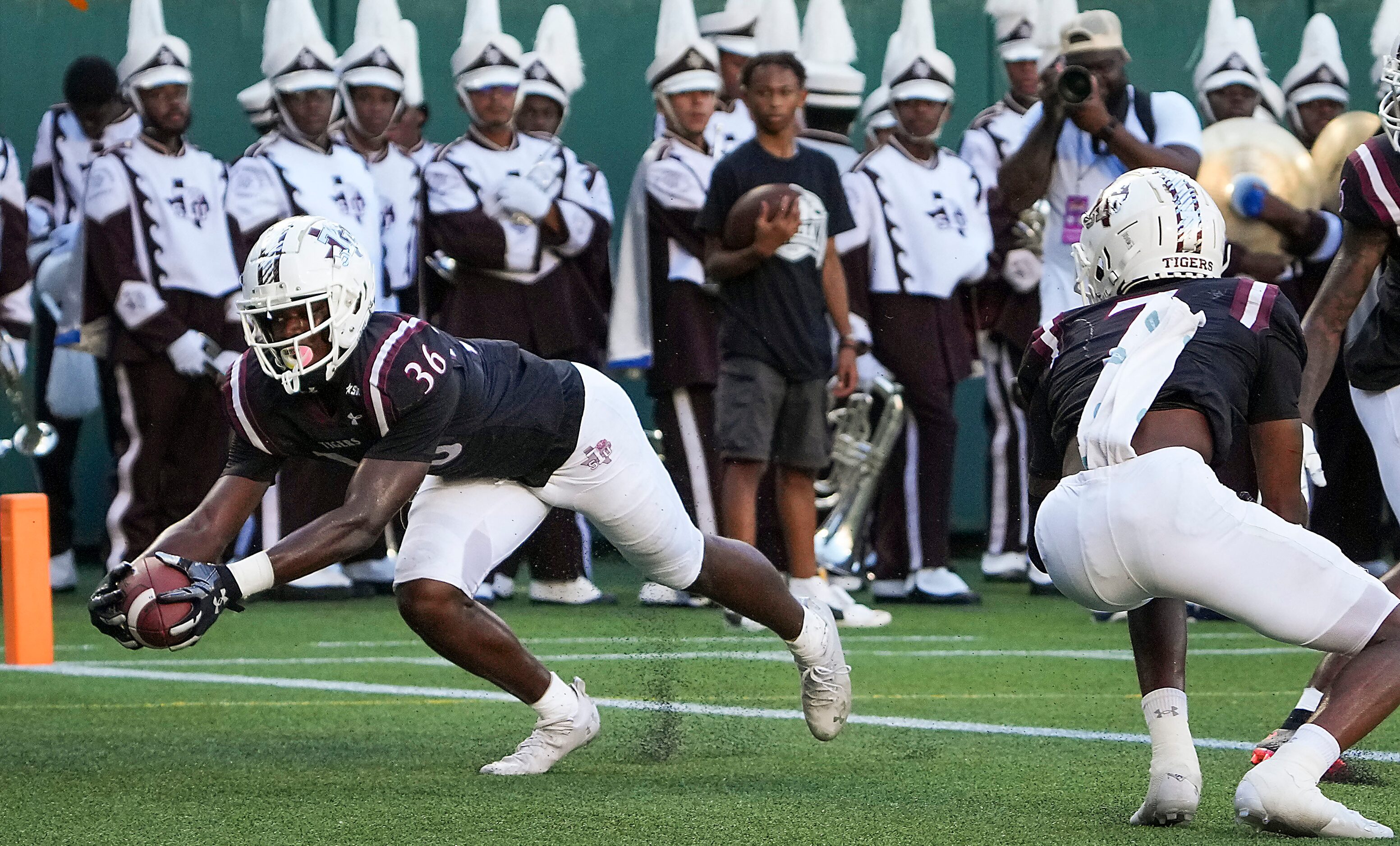 TSU safety Charles George Jr. (36) intercepts a pass in the end zone during the first half...