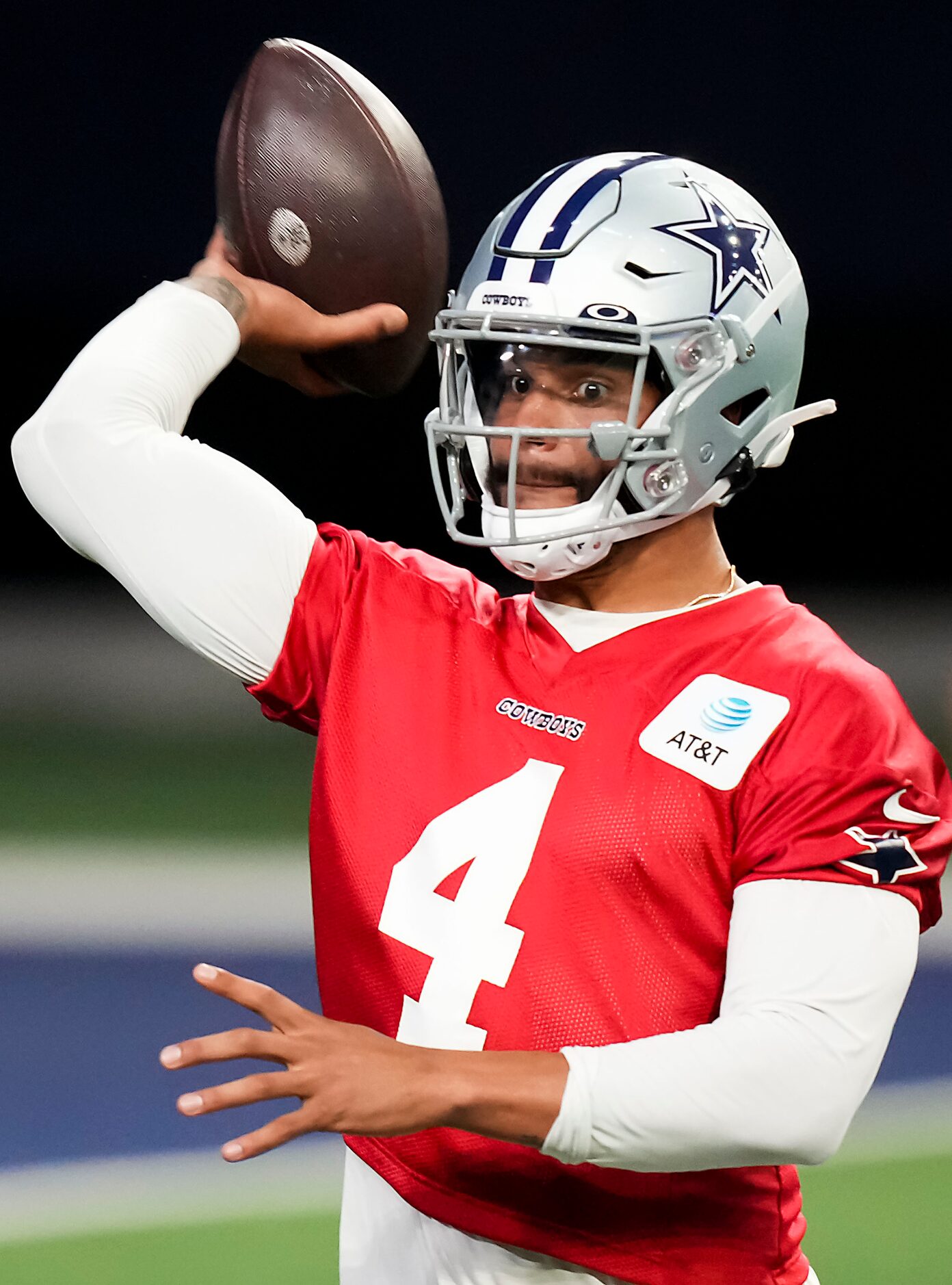 Dallas Cowboys quarterback Dak Prescott (4) throws a pass during the OTA team's practice at...