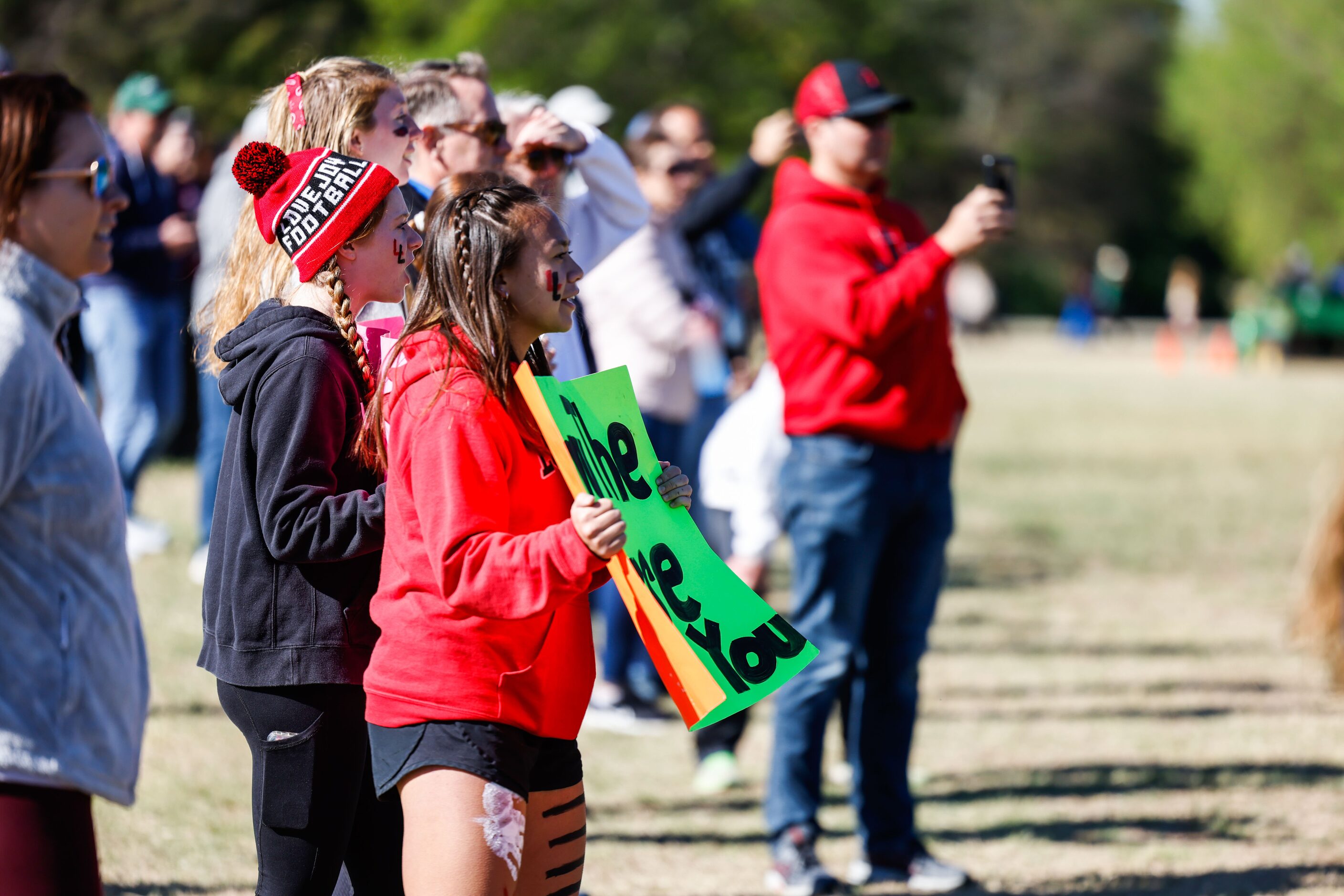 Runners supporters during the Class 5A girls UIL Region Cross Country Championships...