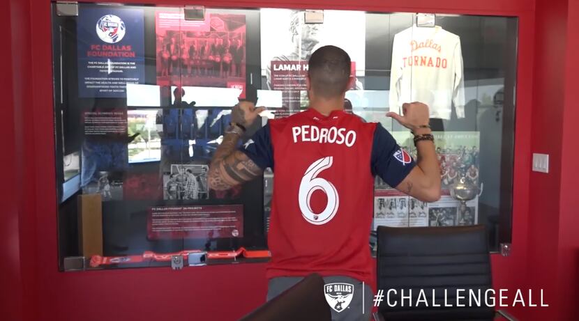 Marquinhos Pedroso shows off his #6 jersey after signing with FC Dallas.