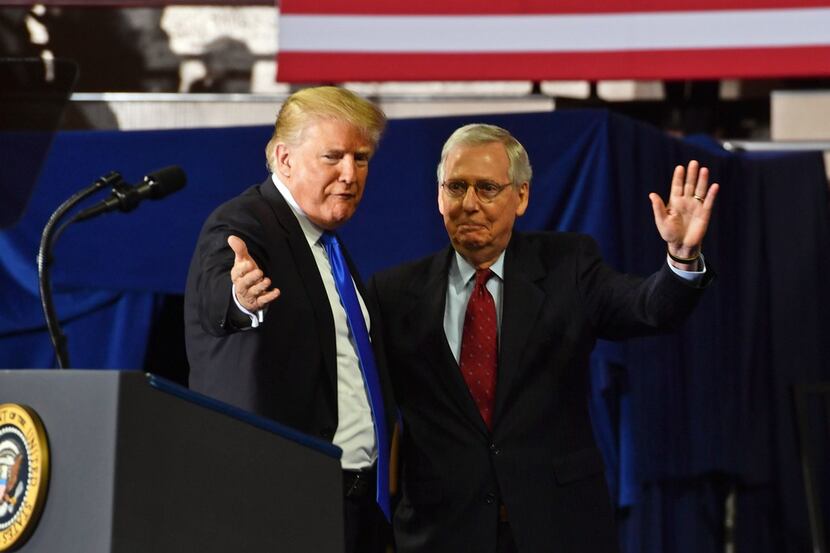 President Donald Trump (left) introduces Senate Majority Leader Mitch McConnell,  R-Ky.,...