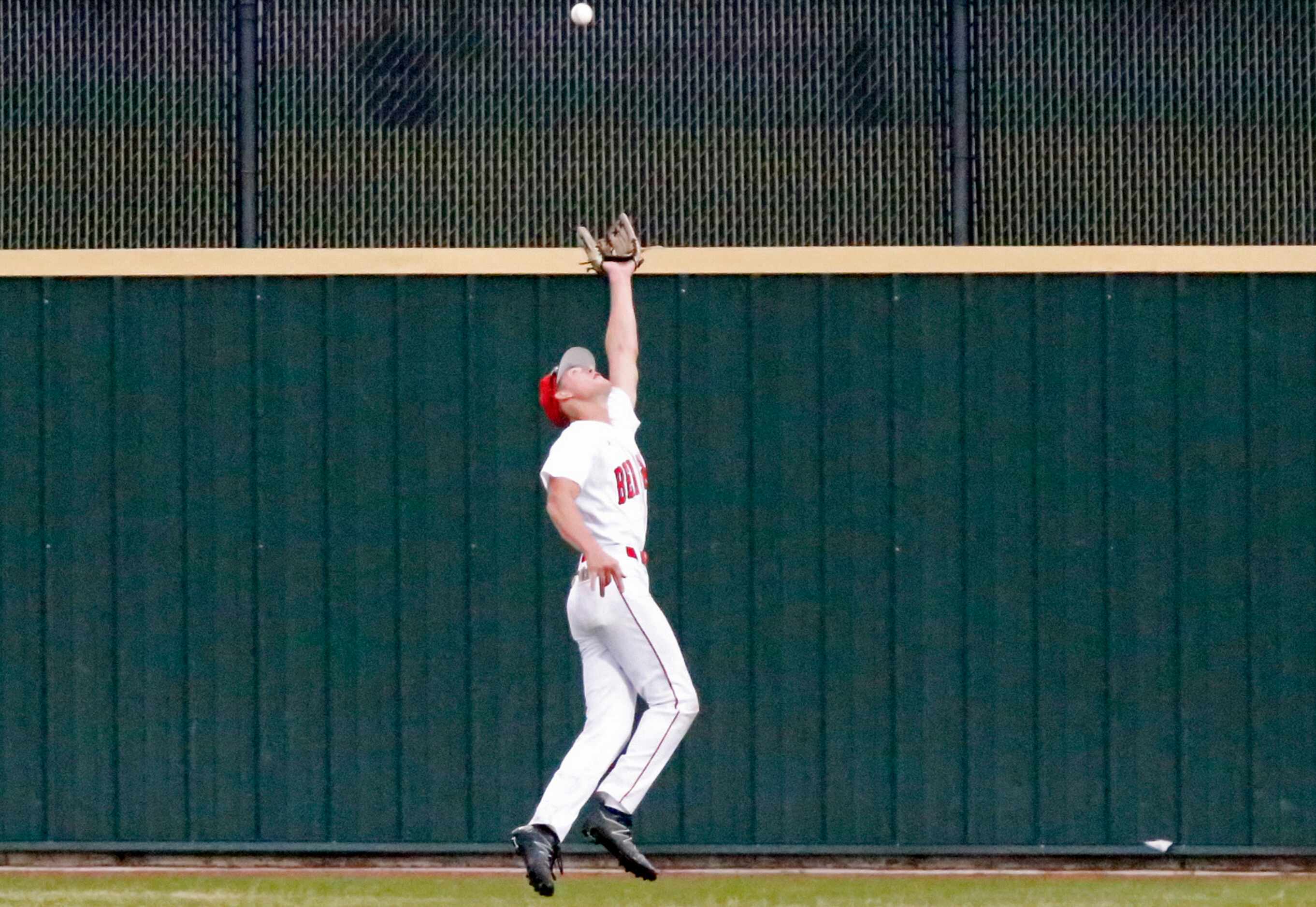 Braswell rightfielder Dylan Krause (26) makes an over the shoulder running catch for an out...