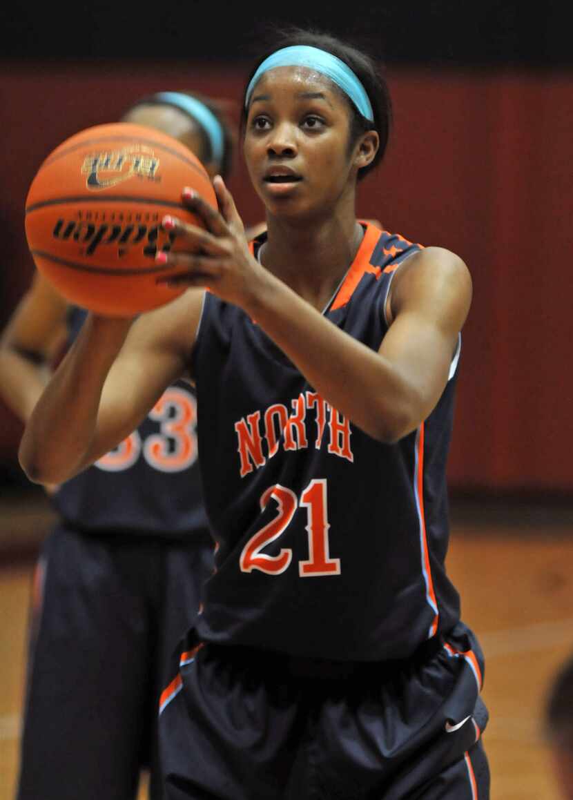 McKinney North junior Chanterria Jackson (21) lines up a free throw against Lovejoy during a...