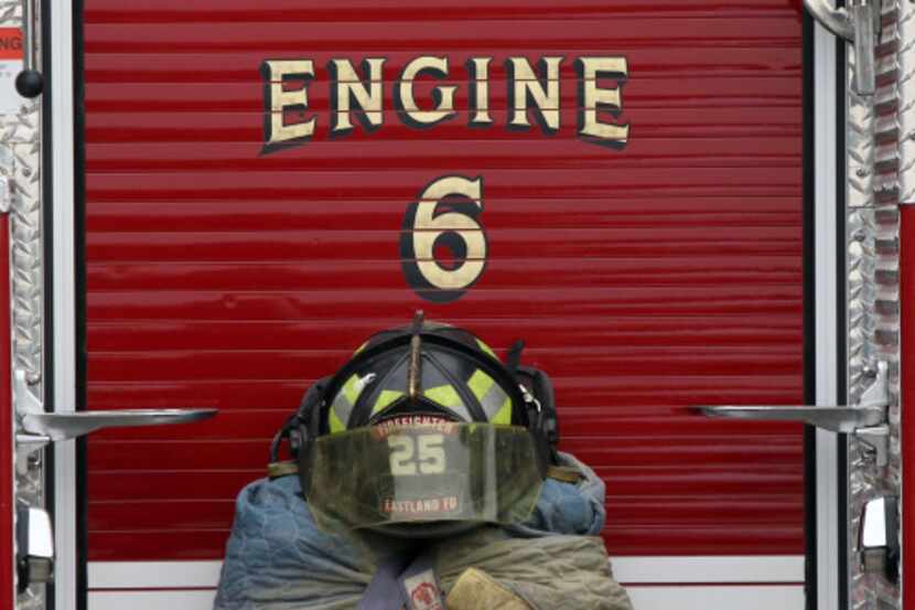 Greg Simmons’ firefighting equipment was placed on the firetruck that took his casket to the...