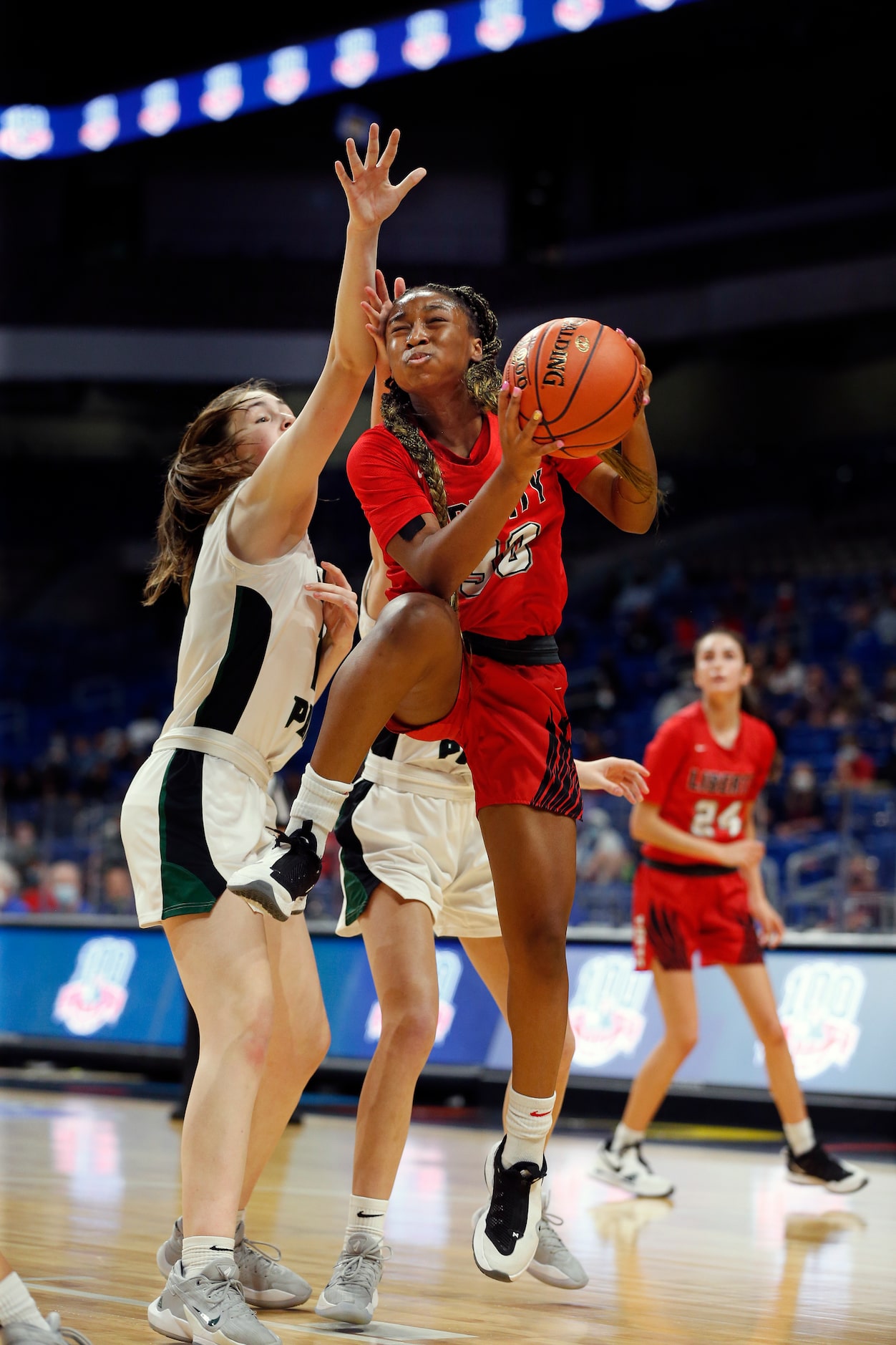 Frisco Liberty Jazzy Owens-Barnett #30 drives for two. Frisco Liberty vs. Cedar Park in...