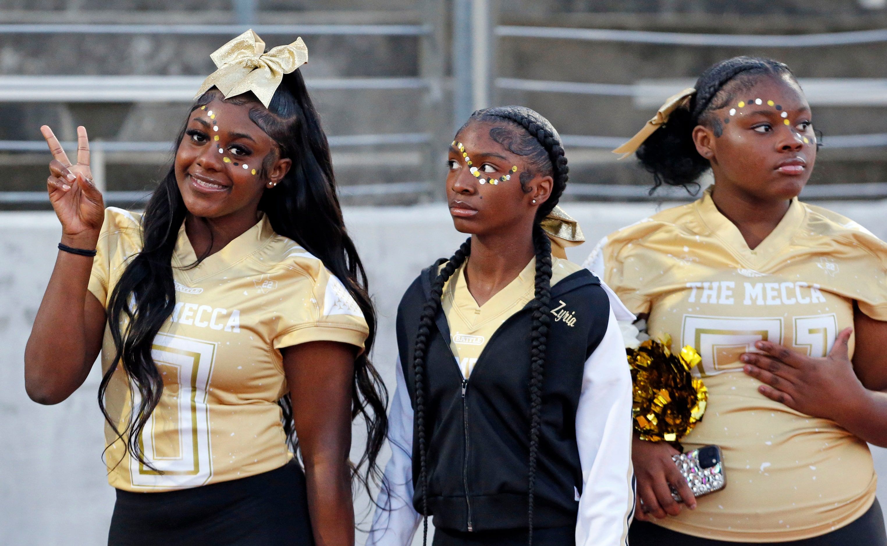 The South Oak Cliff students with face decorations seem pretty happy before tonight’s...