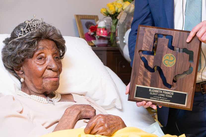 Elizabeth Francis, at her 114th birthday, received a plaque honoring her status as the...
