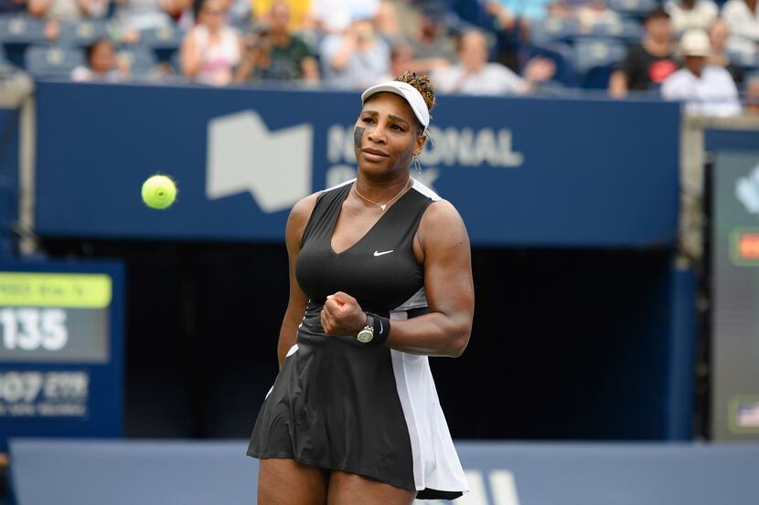 Serena Williams celebrates after defeating Nuria Parrizas-Diaz of Spain, during the National...