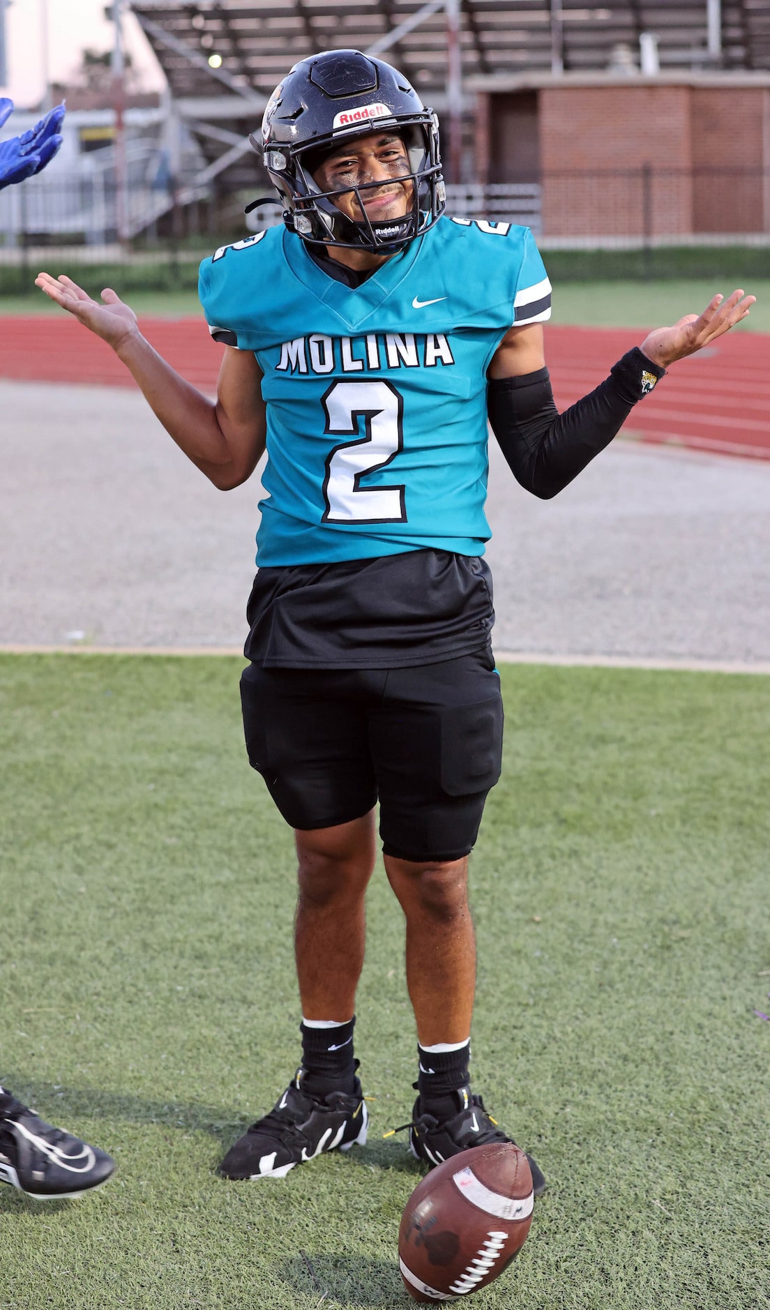 Molina high QB Adan Ochoa (2) celebrates his touchdown during the first half of a high...