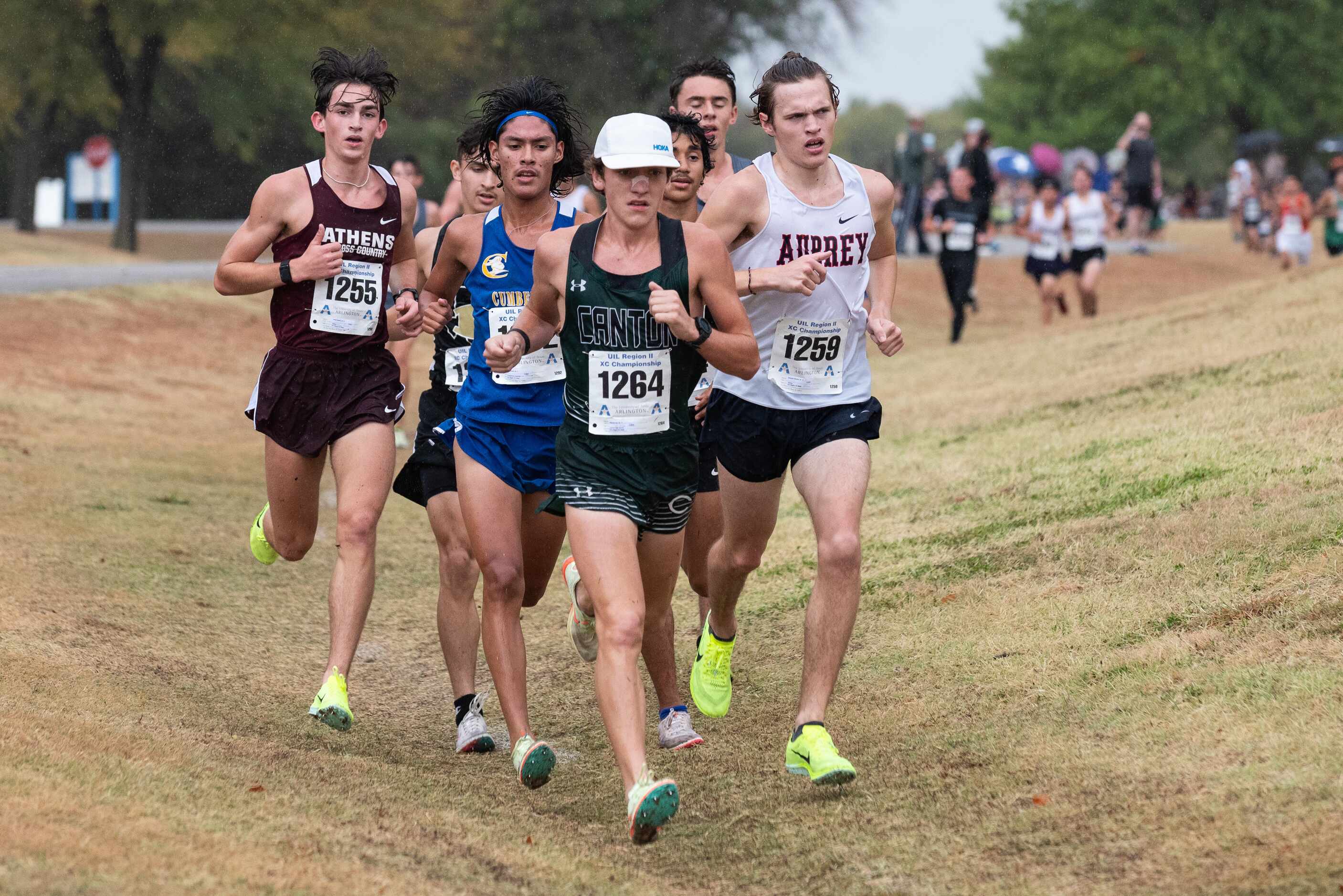 Canton runner Miguel Arce (1264) leads a pack of runners during the 4A Boys UIL Region II...