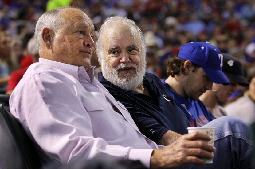 Former Texas Rangers president Nolan Ryan, left, shared the front row with Texas Rangers...