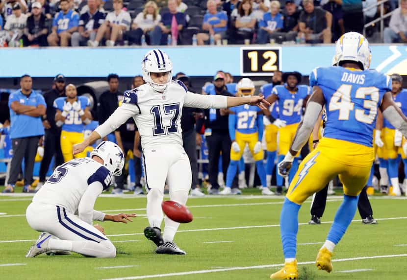 Dallas Cowboys place kicker Brandon Aubrey (17) kicks a last second field goal against the...