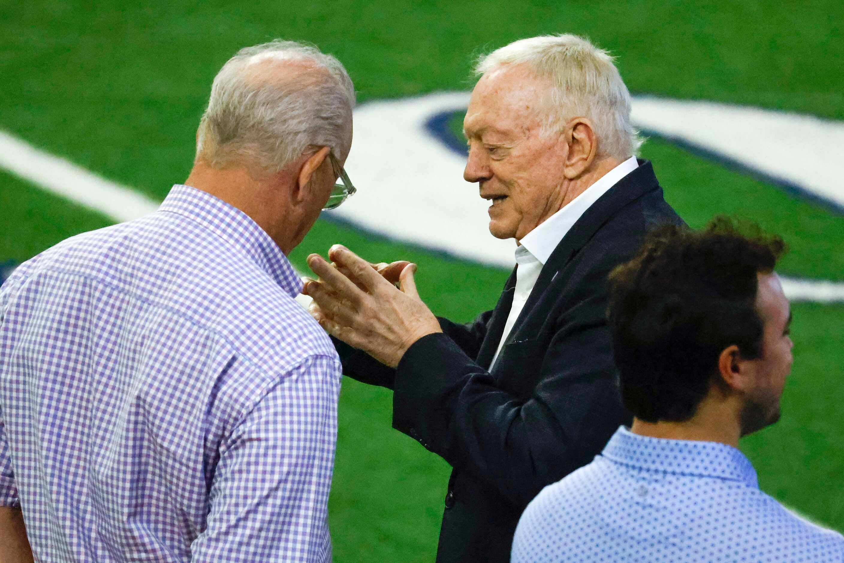 Dallas Cowboys Executive vice president & CEO Stephen Jones (left) talks to owner Jerry...