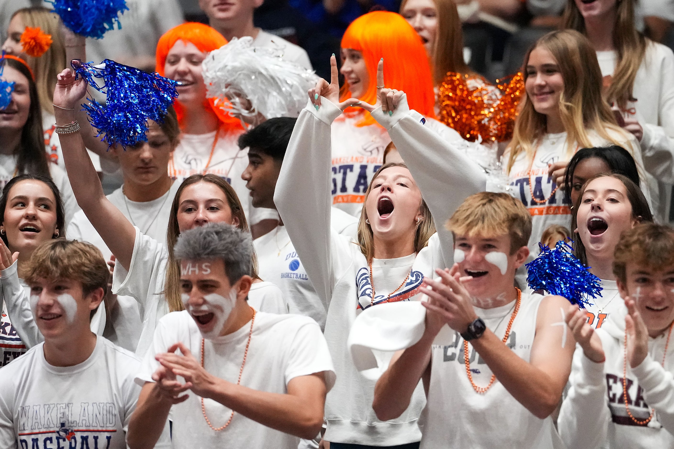 Frisco Wakeland fans cheer their team before the UIL Class 5A Division II volleyball state...