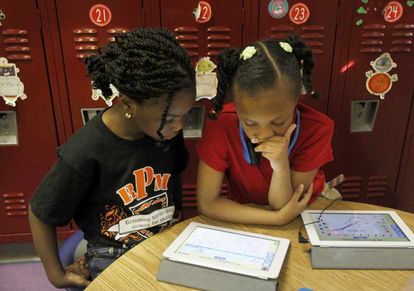  Kindergarten students at Rosa Parks-Millbrook Elementary School in Lancaster worked with...