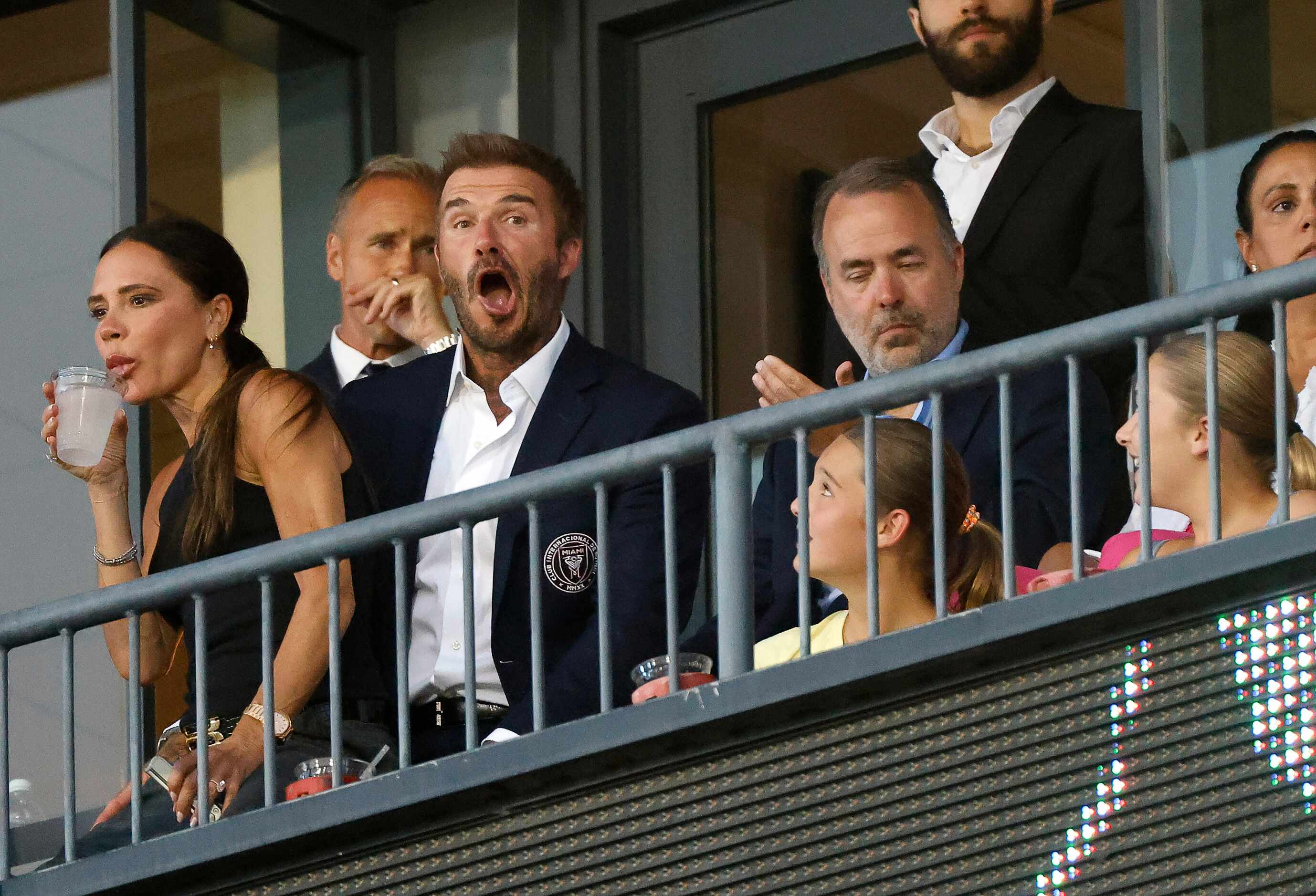 Former European player and Inter Miami’s co-owner David Beckham makes a face at some young...