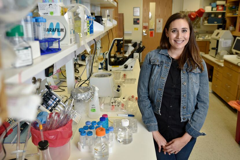 Arielle Woznica, 29, a postdoctoral researcher at UT Southwestern, inside a lab on the...