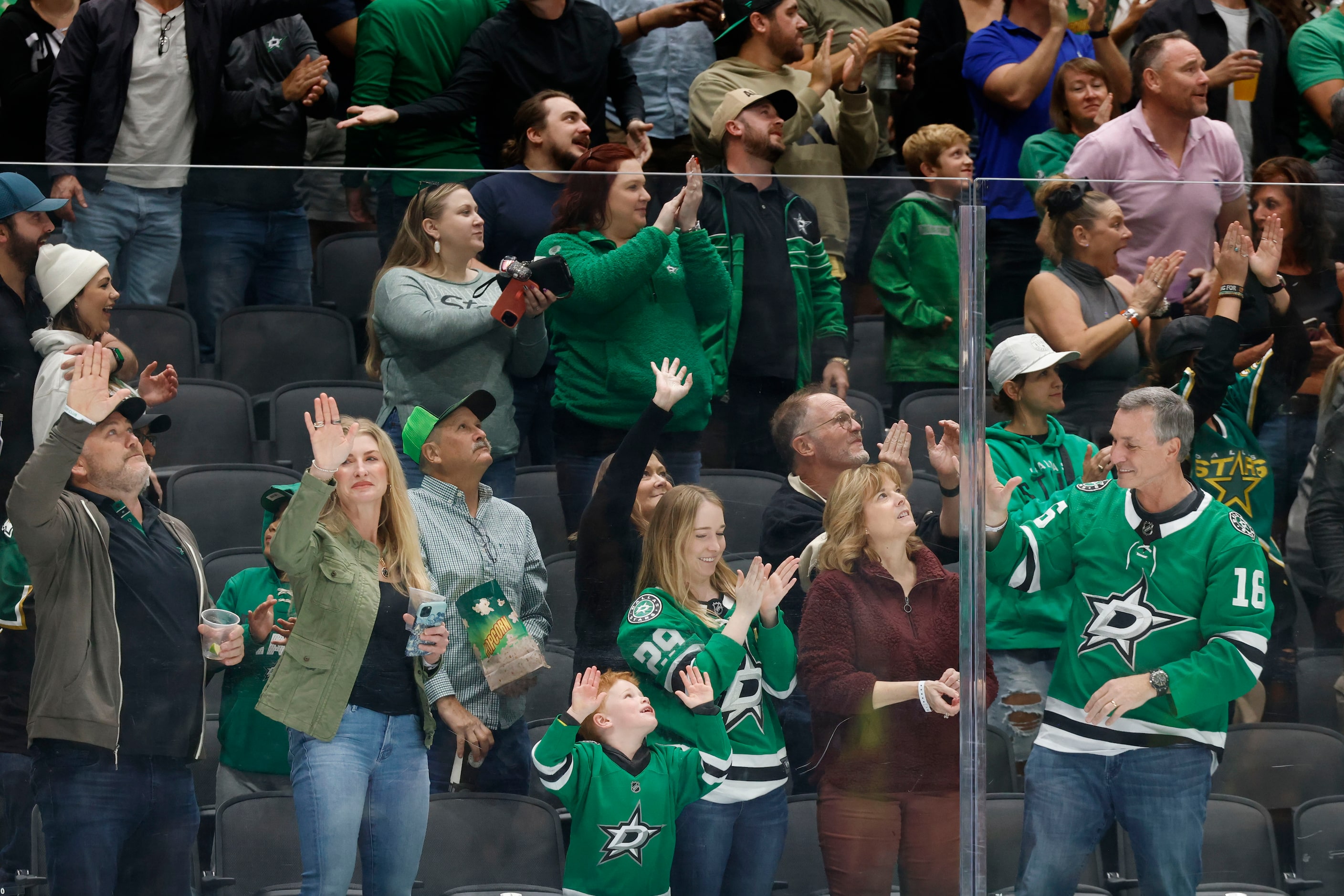 Dallas Stars fans cheer after the first point aigsnt Philadelphia Flyers during the first...