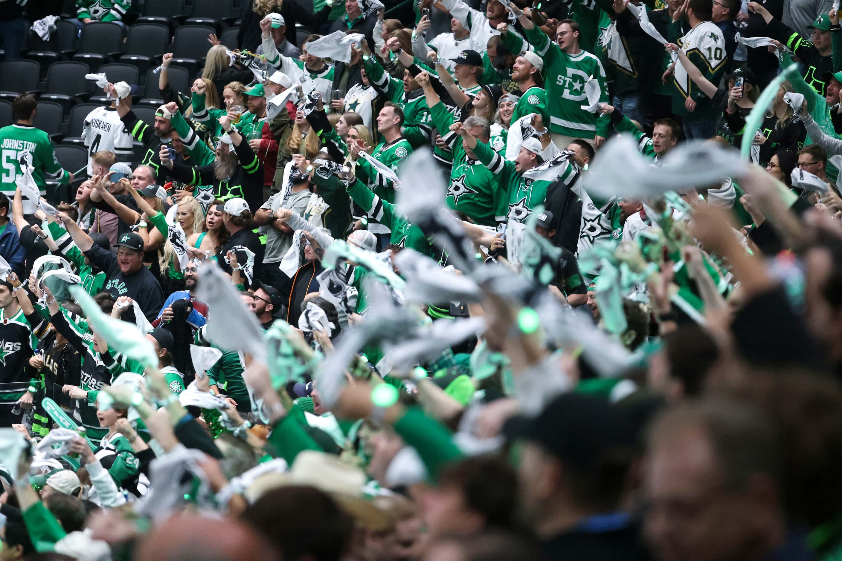 Dallas Stars cheer following the team’s final goal during the third period in Game 2 of an...