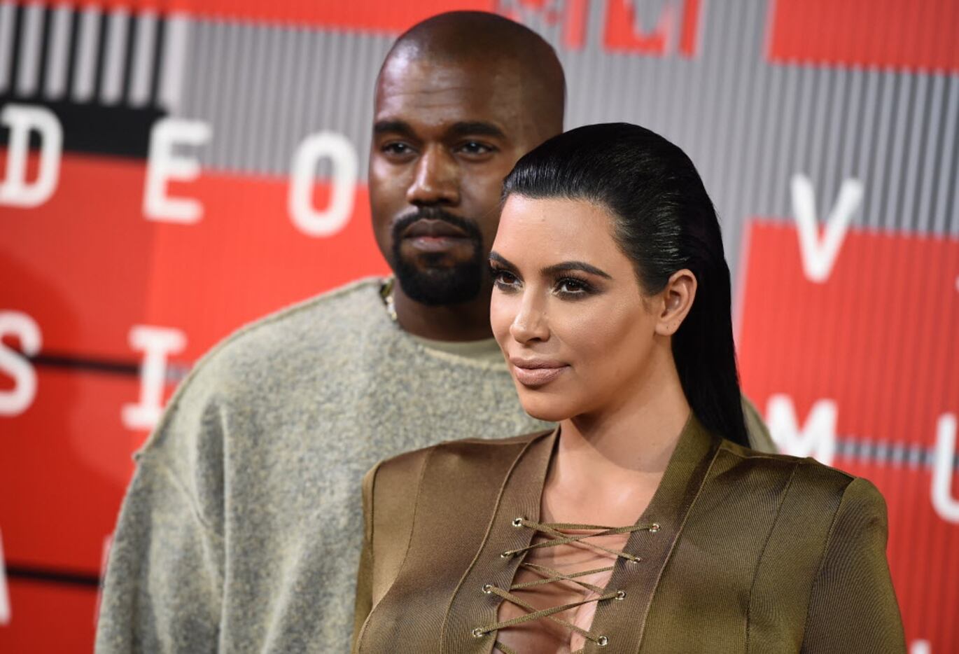 Kanye West, left, and Kim Kardashian arrive at the MTV Video Music Awards at the Microsoft...