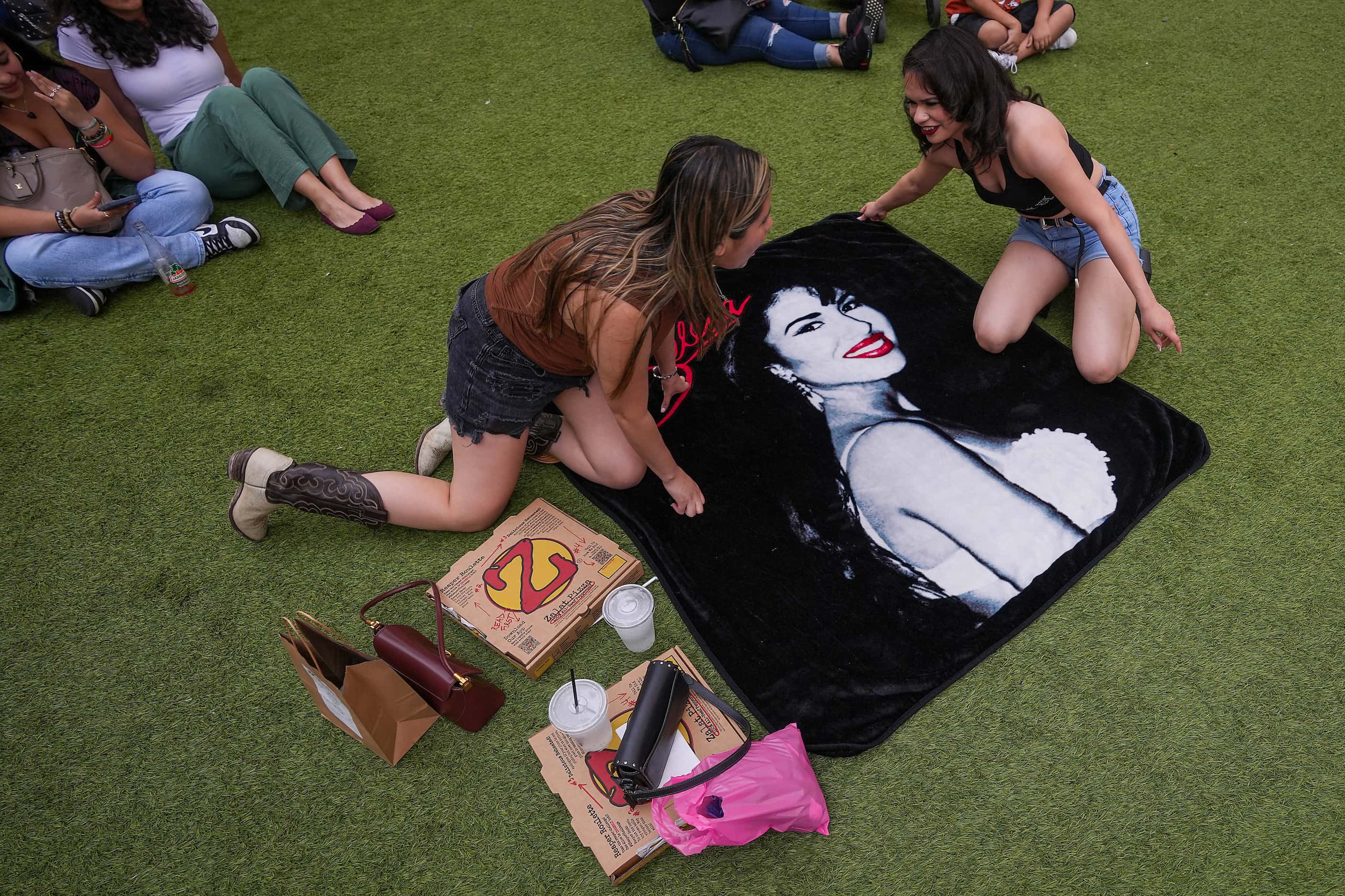 People spread out on the lawn to watch a  screening of the 1997 film starring Jennifer Lopez...