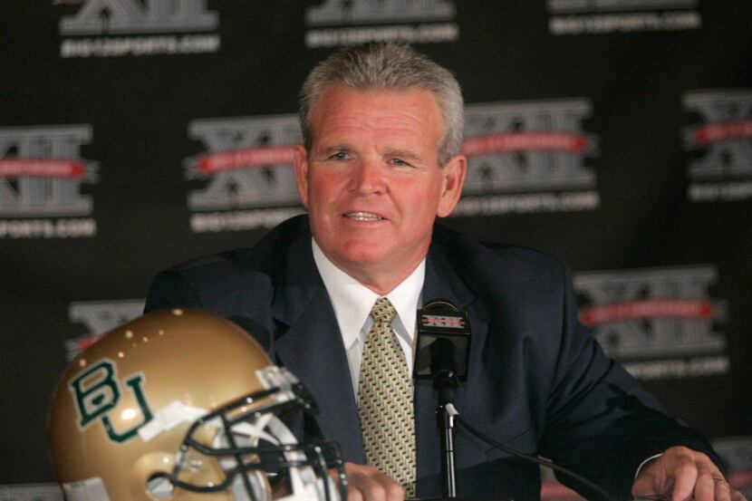 Baylor football coach Guy Morriss answers questions during the Big 12 Conference media day...
