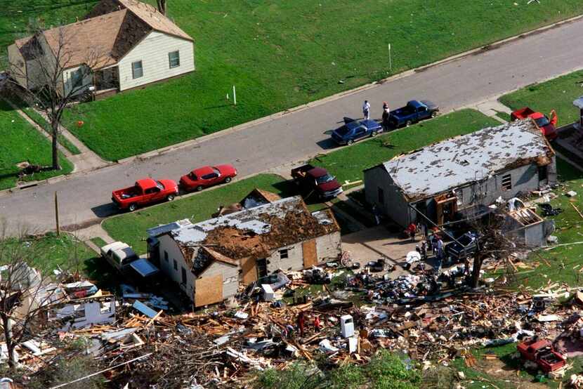 In this March 29, 2000 file photo, a house on the west side of Fort Worth, Texas, sits...