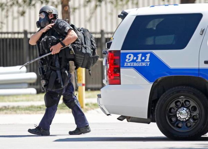 
A Dallas SWAT team member left the scene of the standoff.
