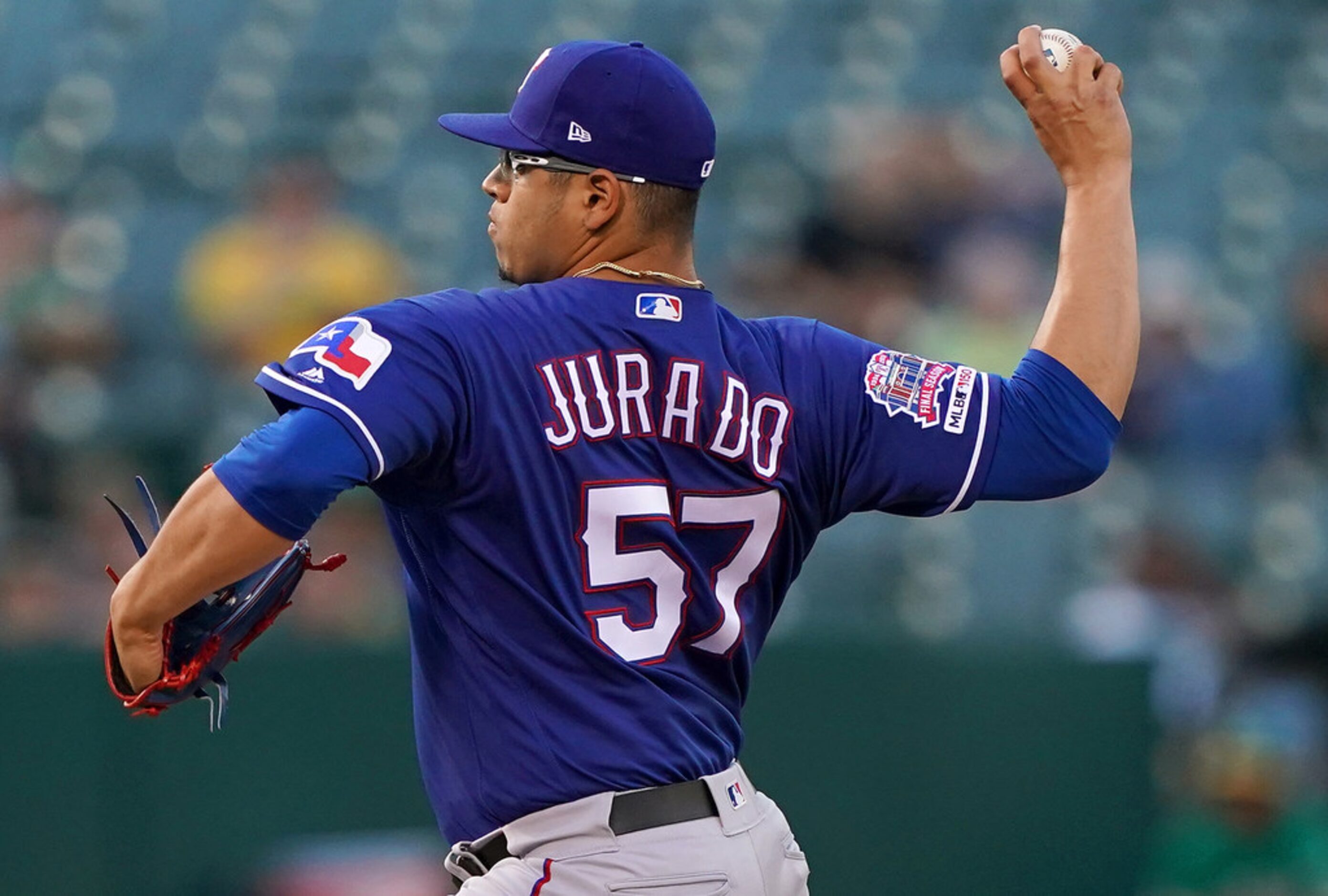 OAKLAND, CA - JULY 25:  Ariel Jurado #57 of the Texas Rangers pitches against the Oakland...